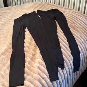 2 pair Athleta Leggings size 12 Black.  Sorry for the wrinkles